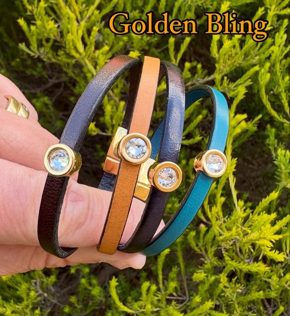 Single thin leather bracelet, with a European small crystal in golden setting . Made with a golden magnetic clasp.