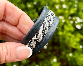 Traditional Nordic Viking cuff in reindeer leather and pewter.