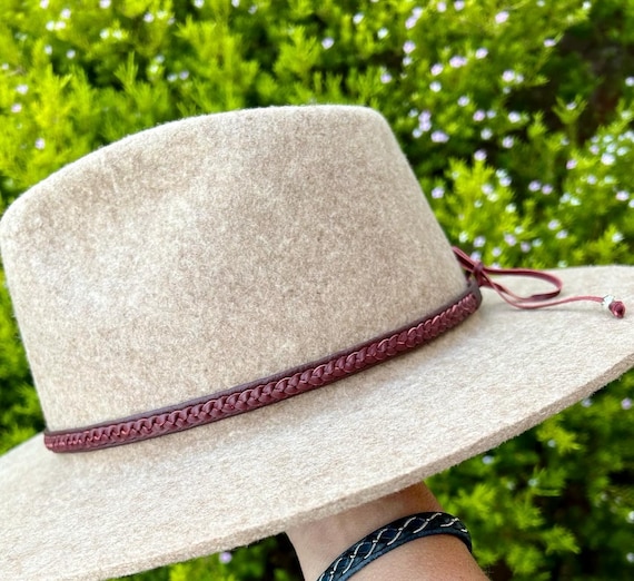 Kangaroo lace braided hatbands, hand sewn on reindeer leather with adjustable fastening.