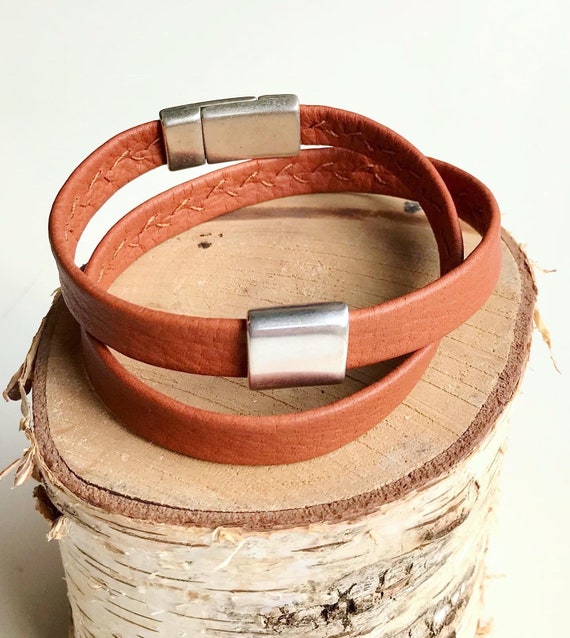 Unisex double wrap around reindeer leather bracelet with a magnetic clasp and a rectangular silver slider.