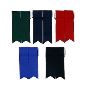 May include: Six pairs of kilt hose garters in various colors, including green, navy blue, red, royal blue, and black. Each pair has a white strap.
