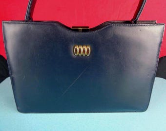 Vintage Clutch-Handtasche aus Leder mit Henkel, Retro-Accessoire aus den 1970er Jahren, hergestellt von Mastercraft Canada