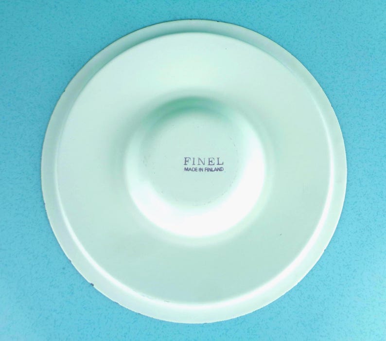 May include: A set of three ceramic mugs with a speckled, matte finish. The mugs are in shades of cream, light gray, and dark gray. Each mug has a simple, minimalist design, perfect for coffee or tea.