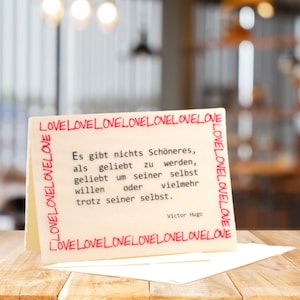 Love individuele vouwkaart met mooie spreuk Victor Hugo