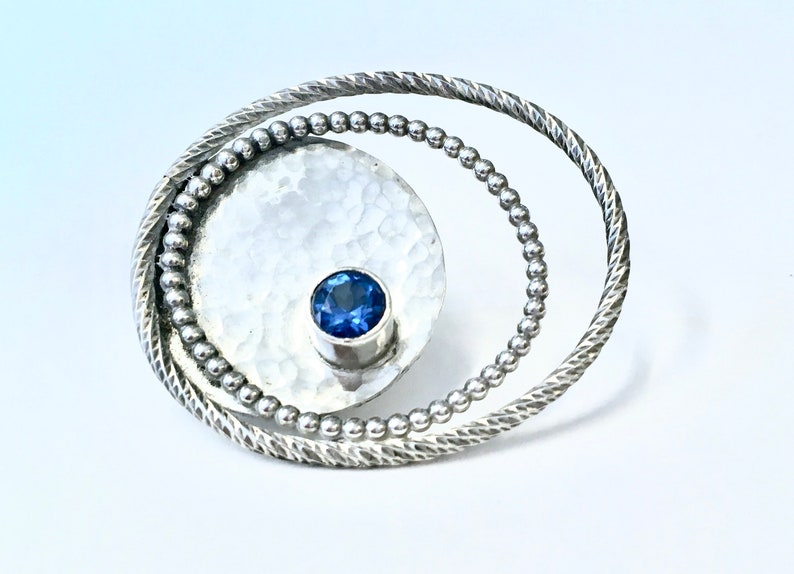Blue Topaz Brooch Hammered Silver Swirls