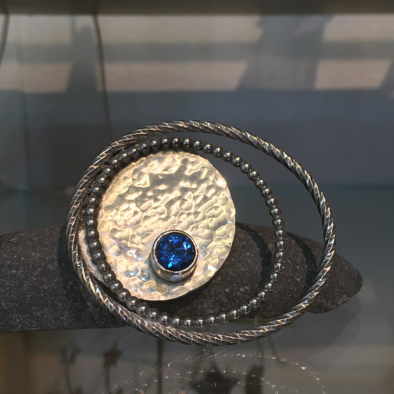 Blue Topaz Brooch Hammered Silver Swirls
