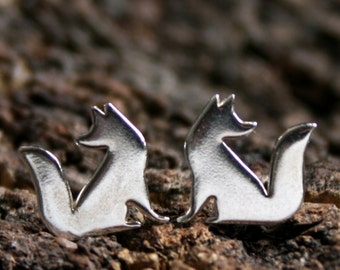 Little foxes. Sterling Silver stud earrings. 'Forest friends' collection. Mis-match or 2 the same. Tiny foxes looking forward or backwards.