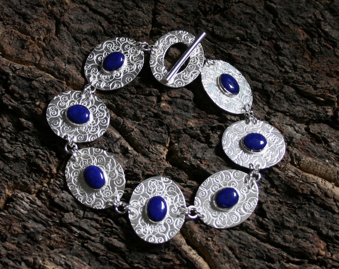 Lapis Lazuli 'Marilyn' bracelet. Classical spiral design. Fully UK Hallmarked Sterling Silver. Silversmith / Metalsmith. Deep royal blue.