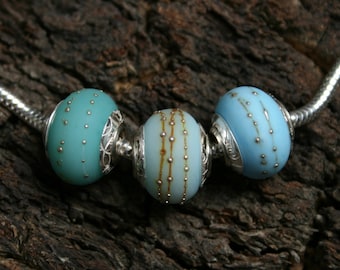 Bali Seas ~ 3 lampwork big hole beads. Hand made full sterling silver core & end caps. Fine silver wrapped, etched. Organic Ocean Blues.