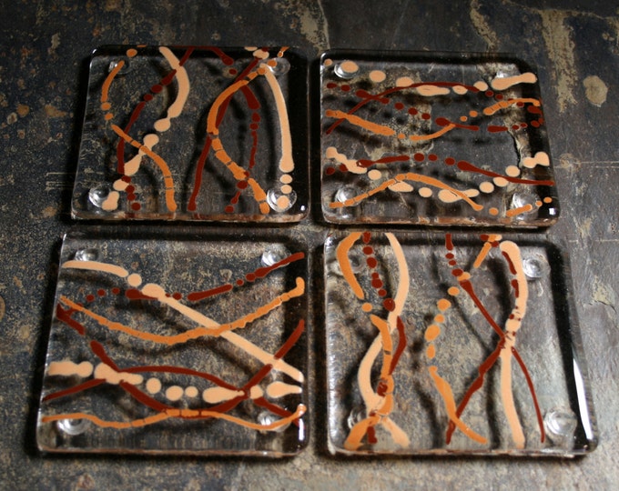 Fused glass coasters. 'Serpentine - Earth'  Shades of brown on a clear base. Squiggly coasters. Choose 2 or 4. Can be customized.