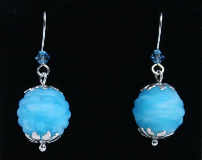 Handmade 'Summer Skies' earrings. Lampworked glass, Swarovski crystal and sterling silver. Fish hook earwires for pierced ears. Swirly blues