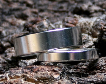 Plain 'Satin shimmer' design. Heavyweight 6 mm Wide Sterling Silver Fully UK hallmarked Wedding ring. Sizes I to Z  (US 4 1/2 - 12 1/2)