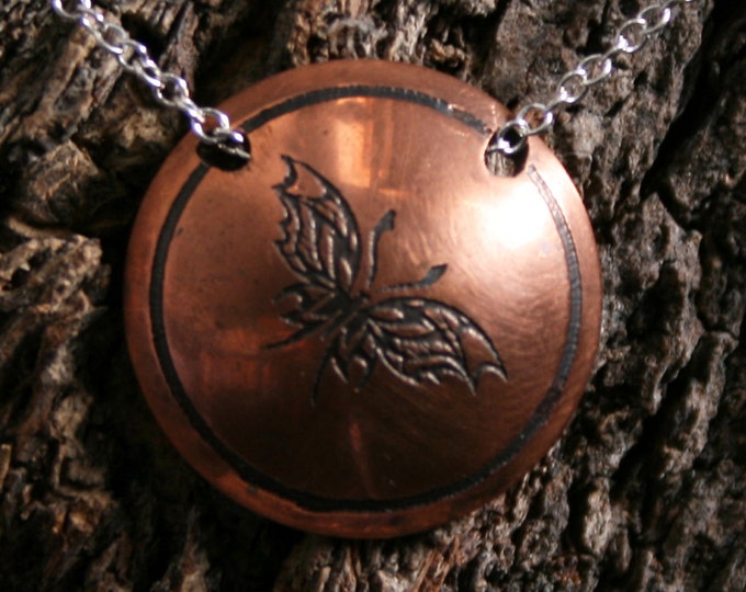 Handmade 'Tribal butterfly 2' Butterfly pendant. Antiqued, etched, domed, copper round pendant on a sterling silver chain.