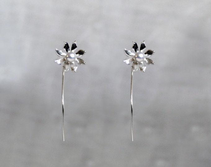 Handmade 'Ma Petite Fleur' earrings. Traditionally hand made sterling silver flower earrings with silver grey pearls, stud style with stem