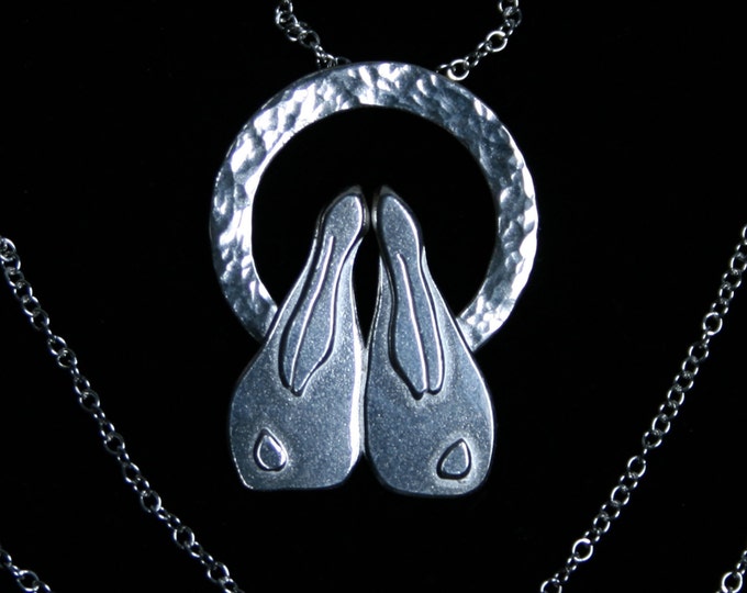 Traditionally handmade 'Moongazing Hare' Pendant. A pair of 3D moongazing hares set against a full moon Fully UK Hallmarked Sterling Silver