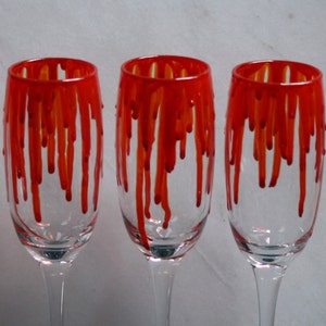 Dripping Blood An exclusive design, hand painted, Champagne glass featuring 'blood' dripping down the sides Horror/ Zombie/ Vampire/ Gore image 1