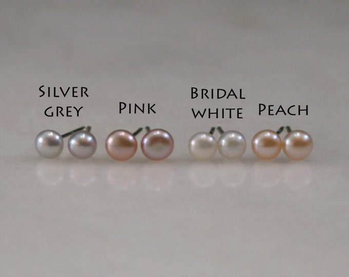 Freshwater Pearl stud earrings. Simple & Elegant. Choose Bridal white, Pink, Peach or Silver-Grey pearls. Sterling silver, 9ct or 18ct Gold.