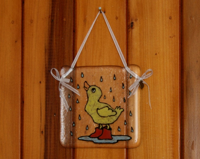 Hand painted, fused glass hanging ornament. 'It's Raining!' Cute duckling in wellies in the rain 10x10cm / 4x4 inches plus hanging ribbon