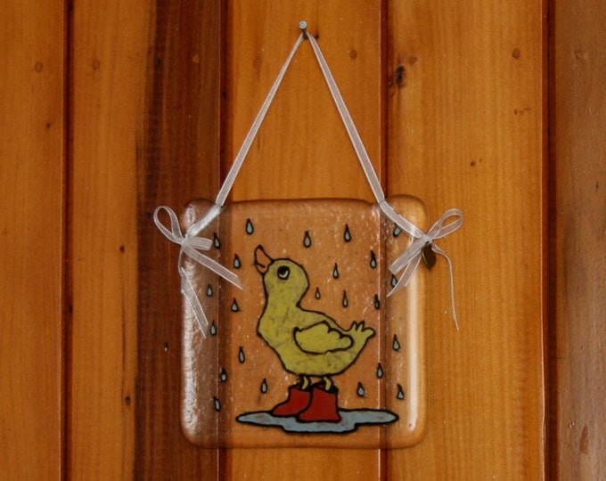 Hand painted, fused glass hanging ornament. 'It's Raining!' Cute duckling in wellies in the rain 10x10cm / 4x4 inches plus hanging ribbon