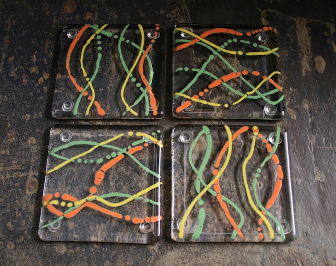 Fused glass coasters. 'Serpentine - Fruity!'  Orange, yellow and green on a clear base. Squiggly coasters. Choose 2 or 4. Can be customized.
