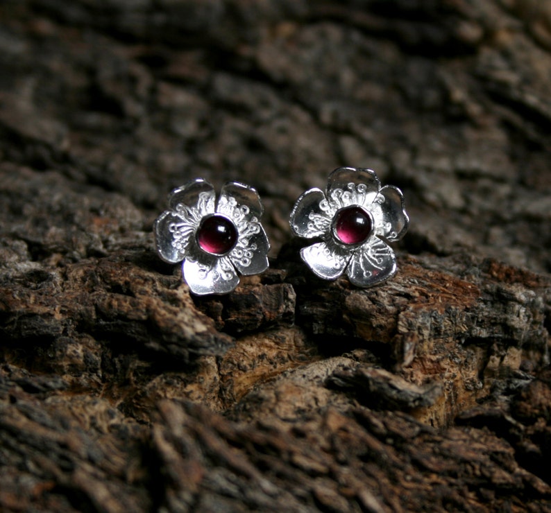 Rosa Garnet & Sterling Silver stud earrings. 'Wildflower series' Exclusive design. Tiny flower, Capricorn birthstone, January gemstone. image 1