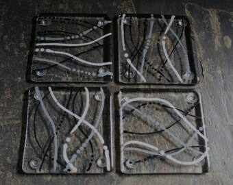 Fused glass coasters. 'Serpentine - Ashes'  Black, white & grey on a clear base. Squiggly coasters. Choose 2 or 4. Can be customized