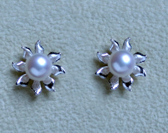 Handmade 'Ma Petite Fleur' earrings. Traditionally hand made sterling silver flower stud earrings with Bridal White pearls, for pierced ears