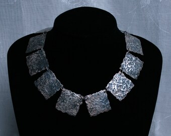 Traditionally made 'Cleo' necklace. Hammered finish with patina. Fully UK Hallmarked Eco-friendly Sterling 925 Silver. Recycled silver.