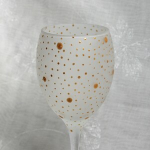 Dotty about You! - Gold. Exclusive design, hand painted wine glass with metallic gold dots and spots encircling an etched bowl