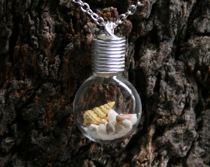 Beach Wishes ~ 'Make a Wish' Pendant ~ Hand blown glass & sterling silver pendant with a real seashell and coral sand inside. Wishing bottle