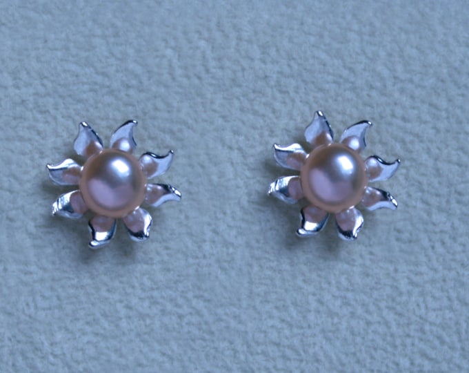 Handmade 'Ma Petite Fleur' earrings. Traditionally hand made sterling silver flower stud earrings with Peach pearls, for pierced ears