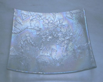 Antarctica - Square. A hand made fused glass decorative plate / trinket dish with a textured shimmering iridescent finish on a clear base.