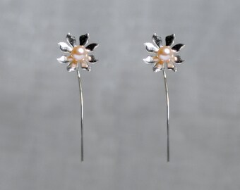 Handmade 'Ma Petite Fleur' earrings. Traditionally hand made sterling silver flower earrings with peach pearls, stud style with stem