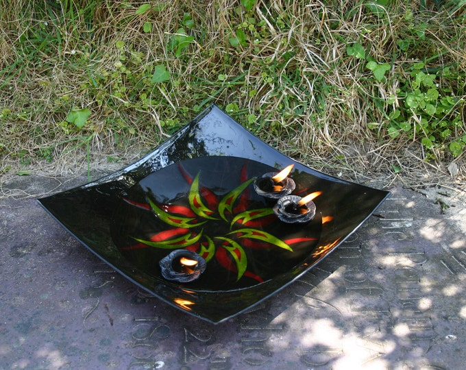 Tribal Dances - Large, exclusive, fused glass bowl in glossy black with a red and yellow tribal pattern. 30 x 30 x 7 cm approx. 12 x 12 x 3"