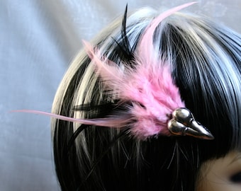 Exclusive 'Baby Pink & Black Raven' hair grip / fascinator in baby pink with hints of  black.