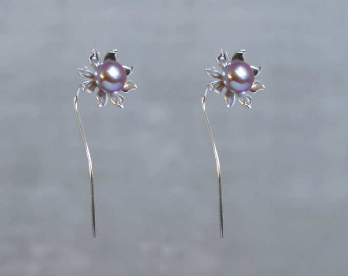 Handmade 'Ma Petite Fleur' earrings. Traditionally hand made sterling silver flower earrings with pink pearls, stud style with stem