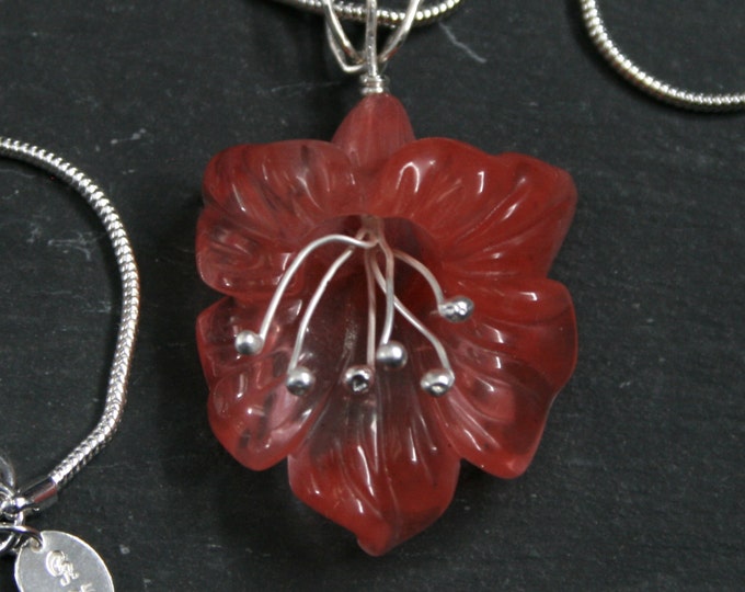 Handmade Carved Volcano Cherry Quartz and 925 sterling silver flower pendant, set on a sterling silver snake chain.
