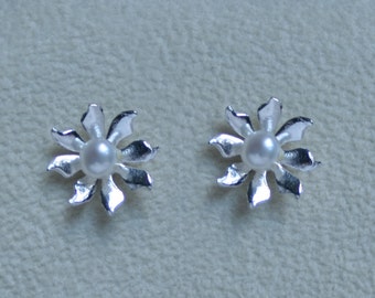 Handmade 'Ma Petite Fleur' earrings. Traditionally hand made sterling silver flower stud earrings with Bridal white pearls, for pierced ears