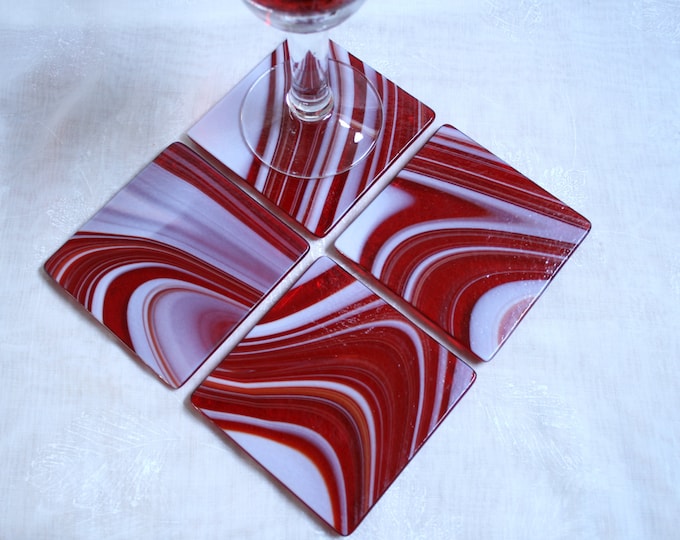 Fused glass coasters. 'Cherry Swirl'  Choose from a pair or a set of 4. Made in a stunning transparent cherry red swirled with opaque white.