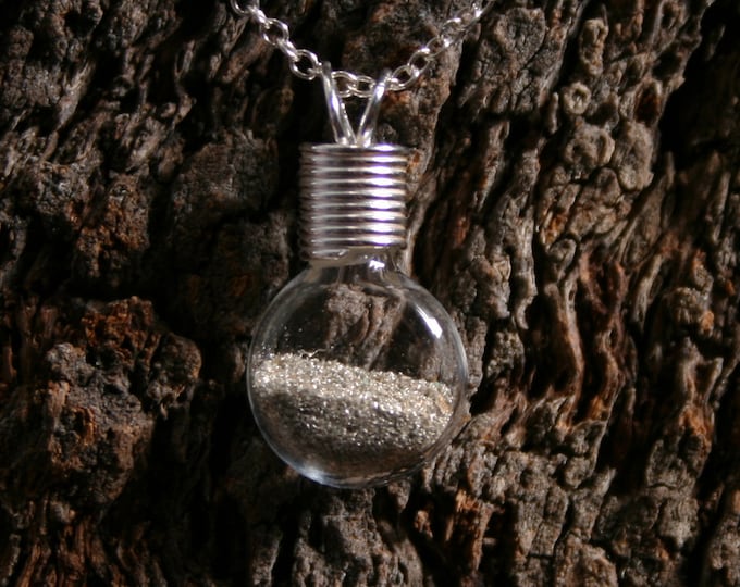 Silver Dust Wishes ~ 'Make a Wish' Pendant ~ Hand blown glass & sterling silver pendant with real silver dust sealed inside. Wishing bottle