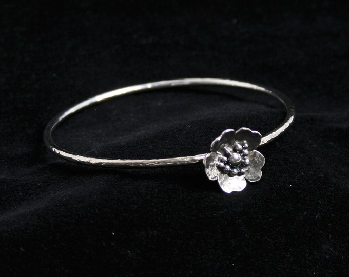 Floating rose bangle 'Wild Rose' Traditionally hand made with hammered finish roses for added sparkle. Fully UK Hallmarked Sterling Silver.