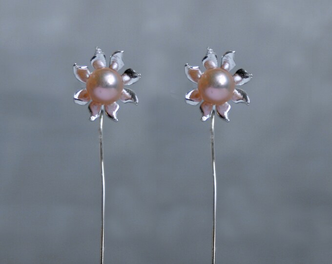 Handmade 'Ma Petite Fleur' earrings. Traditionally hand made sterling silver flower earrings with peach pearls, stud style with stem