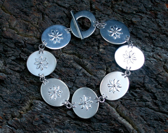 Ma Petite Fleur link bracelet. Fully UK Hallmarked Sterling Silver. Silversmith / Metalsmith. Floral. Flowers. Elegant. Eco-friendly silver.