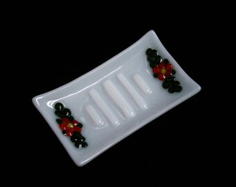 Fused glass soap dish 'Flora in Red' - Unique, hand made, featuring raised red flowers and sparkly green leaves on a white ribbed base.