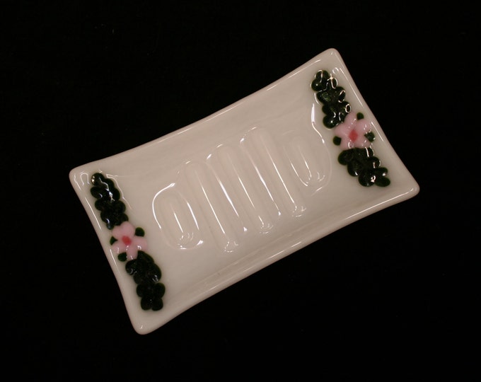 Fused glass soap dish 'Flora in Pink' - Unique, hand made, featuring raised pink flowers and sparkly green leaves on a white ribbed base.