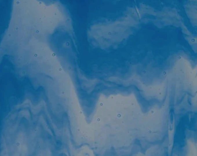 Bullseye Streaky. Clear and Egyptian Blue Opal streaky CoE90 fusing glass.
