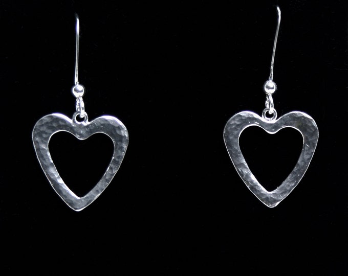 Handmade 'Amore - Lacuna' Heart earrings. Traditionally hand made, sterling silver heart drop earrings. Fish hook ear wires for pierced ears