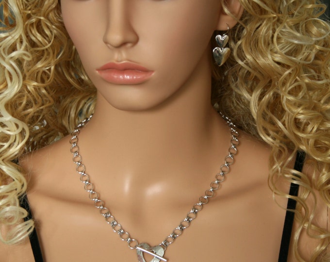 Eco-Friendly Handmade 'Amore ~ Lacuna' necklace. Handmade chain with hammered heart feature catch. Fully UK Hallmarked Sterling Silver.