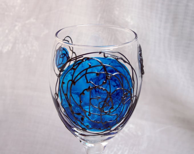 Galaxy - Blue and Pewter - An exclusive design, hand painted, wine glass featuring blue 'planets' swirled with raised pewter 'orbit trails'