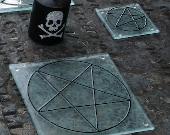 Pair of Pentacle/ Pentagram coasters. Black Pentacle set on a base of 6mm etched clear glass Each measures 10x10 cm / 4x4" Pagan, Wiccan.